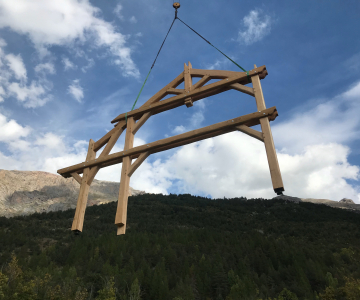 Livraison d'une pièce de l'ossature bois du chalet